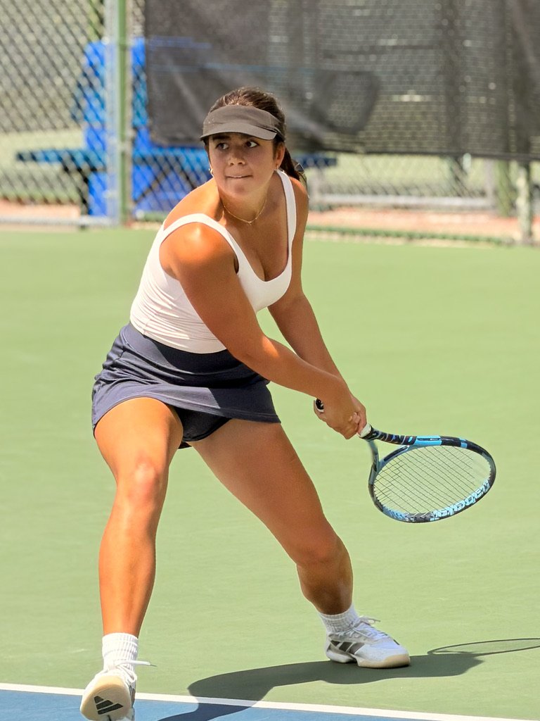 Avery Porter in ready position on court — Franklin High School tennis